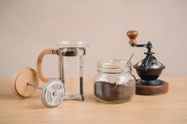 Ground coffee and French press coffee maker