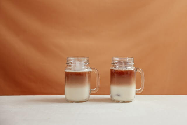 refreshing iced coffee in glass jars